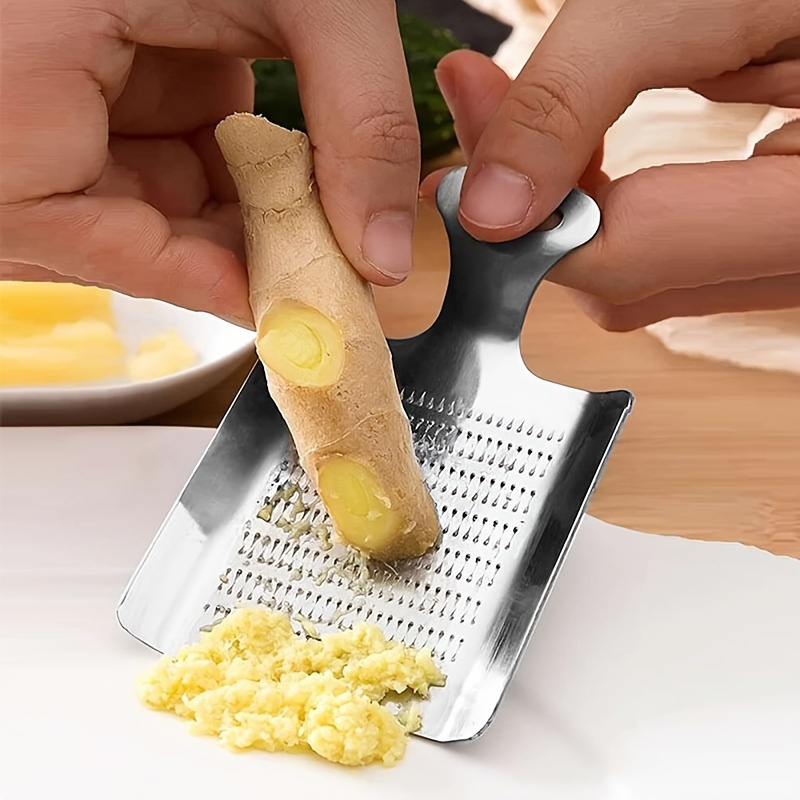 قطعة واحدة من مبشرة الثوم والز - مراجعة Kitchen Appliances Garage وسعره